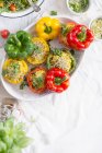 Rice And Pumpkin Stuffed Peppers baked in a white dish — Stock Photo