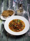 A mixed bean dish with toasted bread — Stock Photo