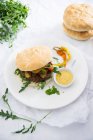 Vegan burgers with chia buns and bean patty — Stock Photo