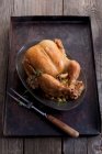 Roast chicken with garlic — Stock Photo