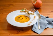 Pumpkin soup with cream — Stock Photo
