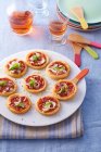 Mini pizzas (party foods) — Stock Photo