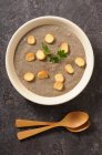 Mushroom cream soup with croutons — Stock Photo