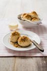 Damson dumplings with buttered crumbs — Stock Photo