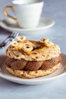 Paris-Brest, ring of choux pastry with hazelnut and chocolate cream — Stock Photo