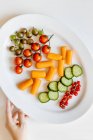 Healthy fresh veggie and berry snacks — Stock Photo