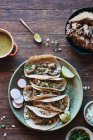 Carnitas tacos with pork and salsa verde (Mexico) — Stock Photo