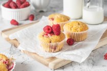 Almond muffins with raspberries — Stock Photo