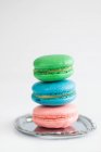 Homemade colourful French macarons with lemon curd — Stock Photo