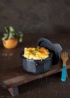 Baked potato with cheese and herbs — Stock Photo