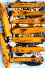 Oven baked pumpkin wedges with miso paste (top view) — Stock Photo
