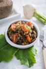 A warm salad with turnip and black beans (vegan) — Stock Photo