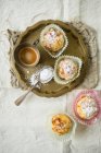 Almond muffins served with coffee (top view) — Stock Photo