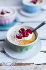 Lemon pudding with raspberries — Stock Photo