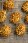 Anzac biscuits on a cooling rack — Stock Photo