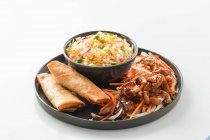 Chaw fan with bitter sweet chiken, carrots and chinese rolls — Stock Photo