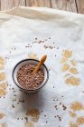 Little bowl of flax seeds — Stock Photo