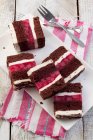 Chocolate cake with cherries jelly and creme — Stock Photo