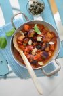 Caponata with almond flakes and capers — Stock Photo