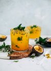 Passion fruit cocktails with mint — Stock Photo