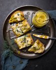 Baked bread with Hokkaido spread, vegan cheese, pumpkin seeds and dill — Stock Photo