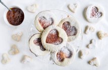 Sweet homemade love cookies with jam — Stock Photo