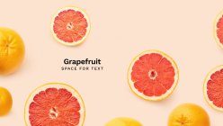 Kreative Banner-Flatlay mit frischen Grapefruits isoliert auf rosa Hintergrund — Stockfoto