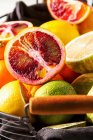 Various citrus fruit in a wire basket — Stock Photo