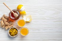 Homemade turmeric lemon ginger shots — Stock Photo