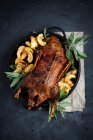 Roasted duck with fried apples and sage — Stock Photo