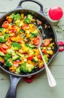 Colourful pan fried vegetables with turmeric — Stock Photo