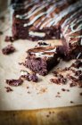 Chocolate brownie with dark and white drizzle — Stock Photo