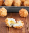 Fried potatoes balls filled with cheese — Stock Photo