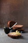 Chocolate bread with elderflower jelly — Stock Photo