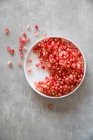 Pomegranate seeds in a small bowl — Stock Photo