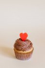 Close-up shot of delicious Cupcake with chocolate cream — Stock Photo