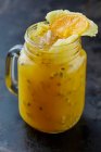 Passion fruit juice with pineapple and orange — Stock Photo