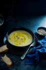 Winter jerusalem artichoke soup wit black pepper and olive oil — Stock Photo