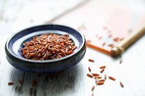 A bowl of red rice — Stock Photo