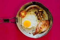 English cooked breakfast in an old frying pan — Stock Photo