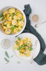 Potato salad with yellow courgettes, field beans and dill (vegan) — Stock Photo