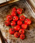 Fresh tomatoes on a wooden board. the concept of healthy life. — Stock Photo