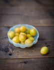 Mirabelles in bowl close-up view — Stock Photo