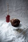 Vegan chocolate cake with a chocolate nougat glaze and grated rice milk chocolate — Stock Photo
