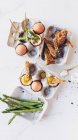 Soft boiled eggs with asparagus and toasts — Stock Photo