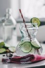 Water with fresh cucumber — Stock Photo