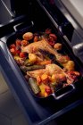 Chicken legs with vegetables fresh from the oven — Stock Photo