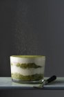 Matcha powder dusted over matcha tiramisu — Stock Photo