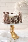 Layered cake in a gingerbread house for Christmas — Stock Photo