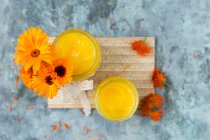 Marigold ointment in screw top jars — Stock Photo